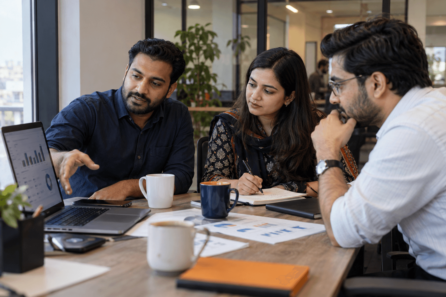 BaliTech team in a business meeting discussing operations